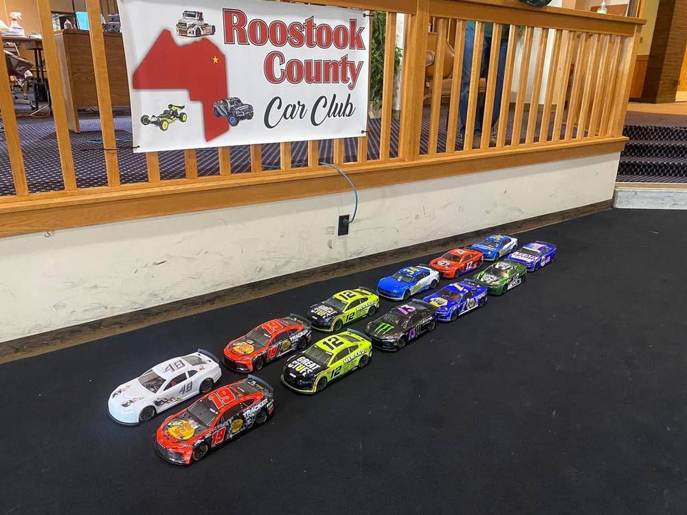 Lineup of RC NASCAR stock cars under the RCCC banner