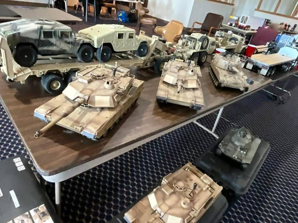RC military models — tanks and Humvees on display